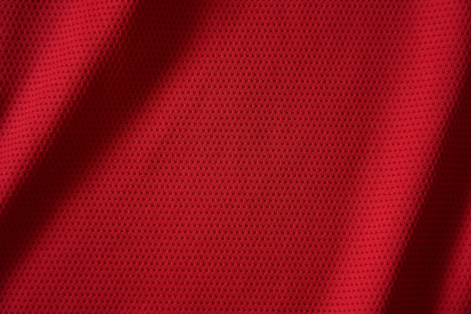 Farbiges Trikot mit Grasfleck